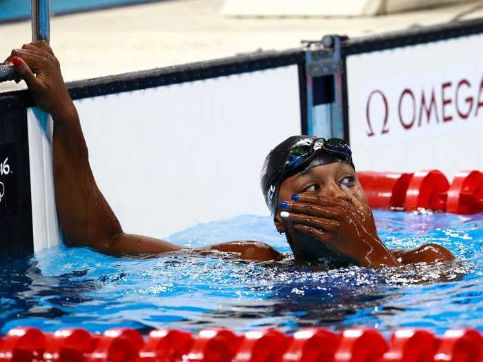 Simone Manuel reacts after winning gold.