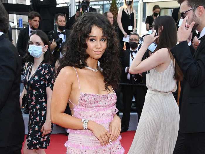 Léna Mahfouf, also an influencer, arrived in a pink slip dress that was covered in sequins.