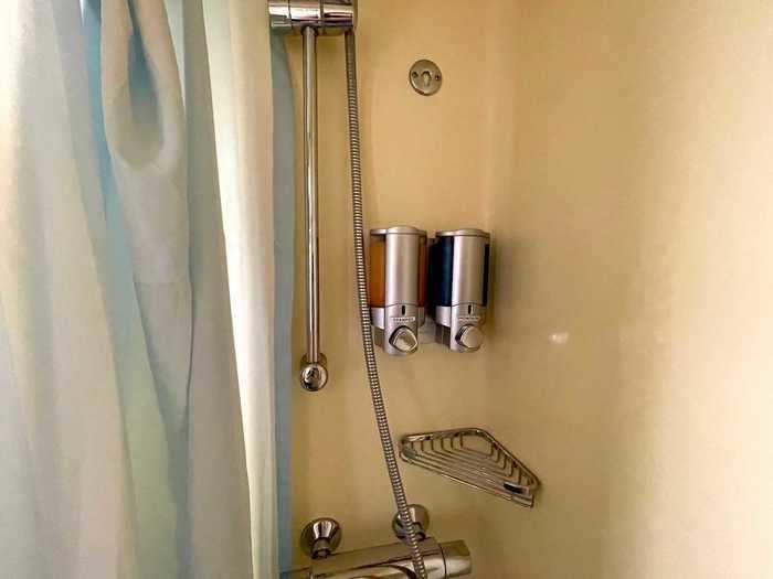 Inside the shower, there are spots for your own toiletries along with shower gel for guests.