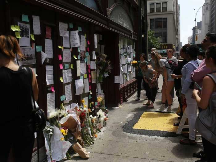 When Bourdain died in 2018, fans left notes, photos, and flowers at Les Halles