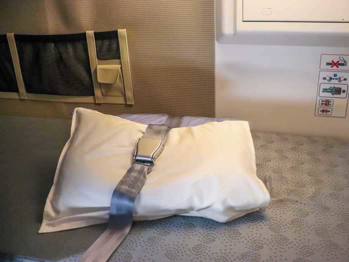 Seatbelts are installed so resting flight attendants can sleep while safely strapped in during turbulence or any other time the seatbelt sign is on.