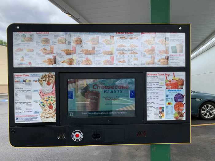 Each drive-in spot is essentially a drive-thru in miniature, with a sign displaying Sonic