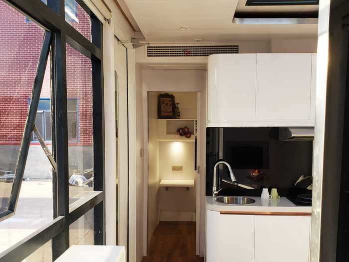 Like its smaller sibling, the almost 280-square-foot Cube Two has a living room, two beds, a kitchen, and a bathroom, all with the same furnishings as the Cube One.