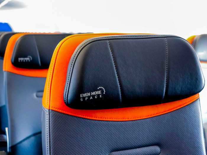 Even more space seats are nearly identical to standard core seats, with both offering adjustable headrests, in-seat power, and seat-back entertainment screens.