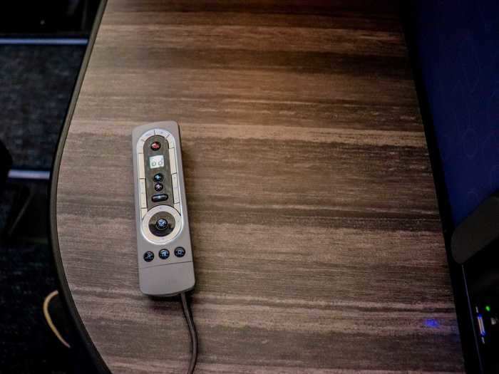 The in-flight entertainment system can be controlled by touch or by using one of the tethered remotes that also act as game controllers. Device-pairing is also an option so flyers can use their phones as a remote.