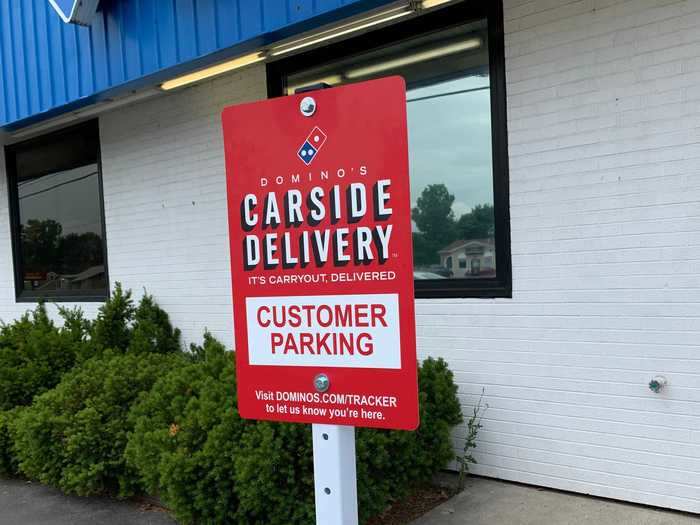 There was a parking spot right in front of the entrance marked for carside delivery.