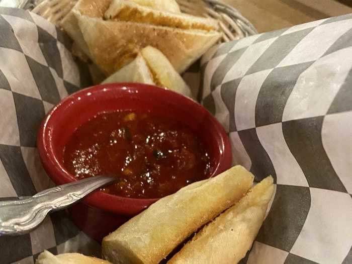 When I sat down at my table, I first ordered the garlic bread, which was delicious.