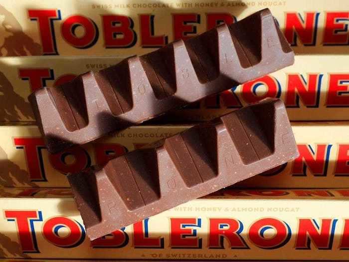 Mondelez also owns Swiss chocolate company Toblerone, which makes distinctively triangular chocolate bars. In 2014 it reduced the weight of its bars by 25% by adding more space between each piece - but reversed the decision two years later after public outcry.