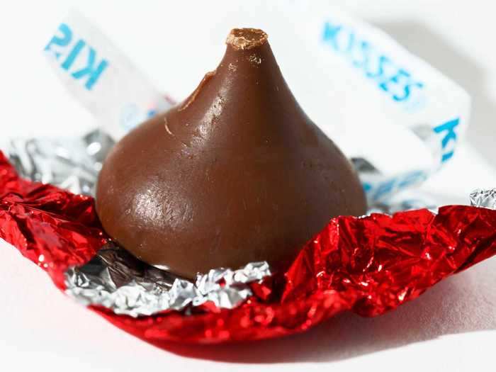 Hershey cut down its 18 ounce pack of dark chocolate Kisses by almost two ounces.