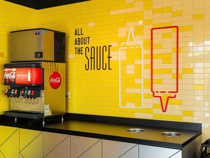 This includes hinged graphic metal panels and subway tiles ...