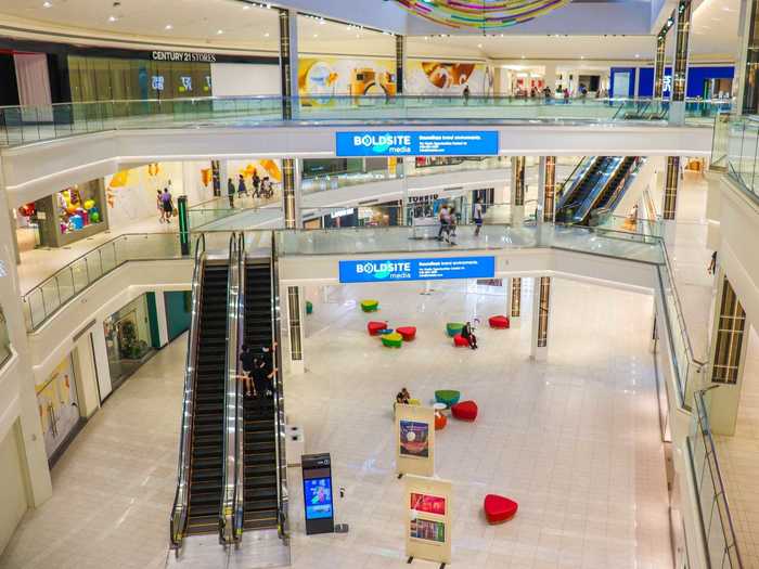 I entered the mail from the retail parking lot on the south side. At first, the three-level structure seemed deserted despite a crowded parking lot on the weekday of my visit.