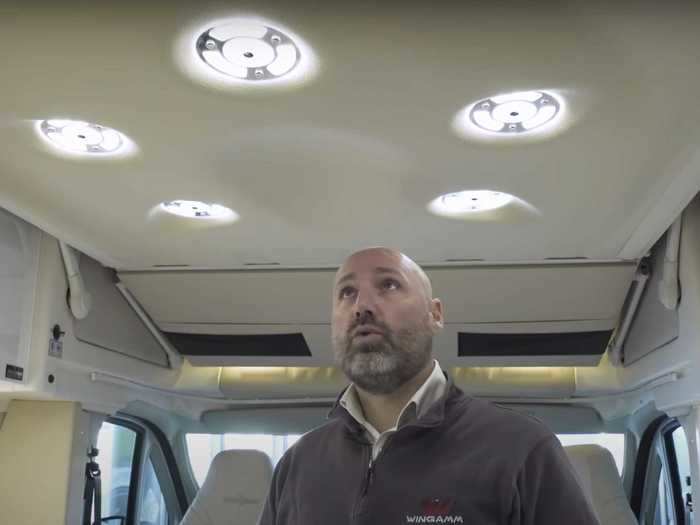 When you need to brighten up the tiny home on wheels during a remote workday, just use the overhead LED lights, which are both dimmable and color-changing.