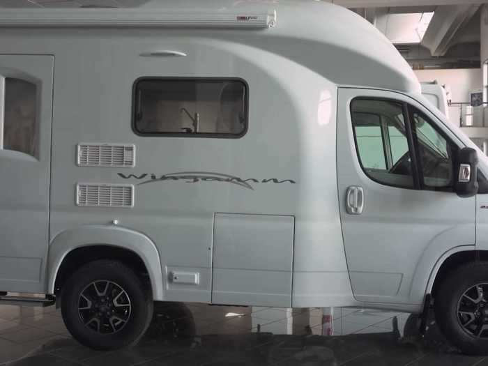 The camper is 17 feet, 9 inches long, which should fit in most standard US parking spots.