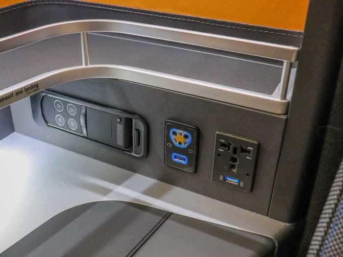 Other seat amenities include a 110V AC power outlet and USB charging port...