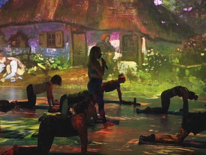 Yoga at Immersive Van Gogh began in Toronto after a local instructor approached the exhibitors with the idea.