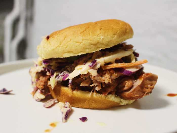 Stewart recommends serving the pulled pork in a sandwich with coleslaw and pickles.