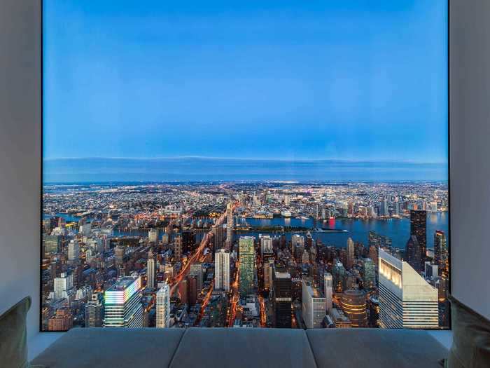 These windows occupy most of the 12.5-foot tall walls, providing sky-high views of the city.