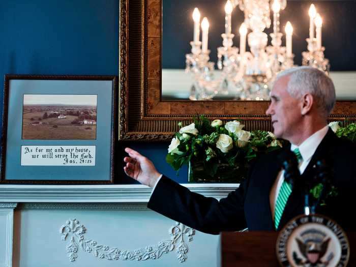 The dining room remained Biden blue, but the Pences added their own personal touches.