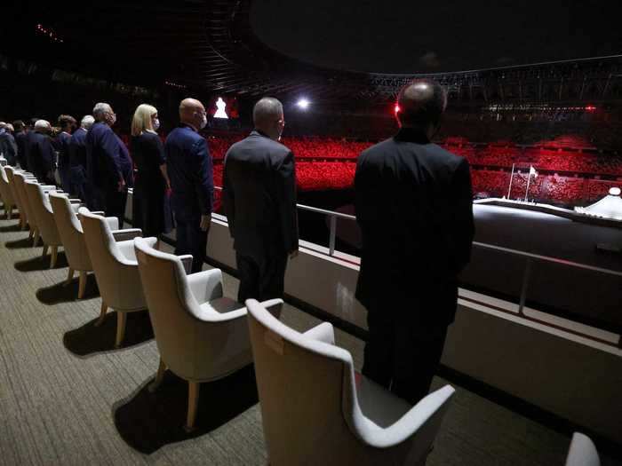 NOW: Tokyo 2020 - VIP officials - some of the only people in attendance at Olympic Stadium outside of athletes and performers - look on during the opening ceremony in Tokyo, Japan.