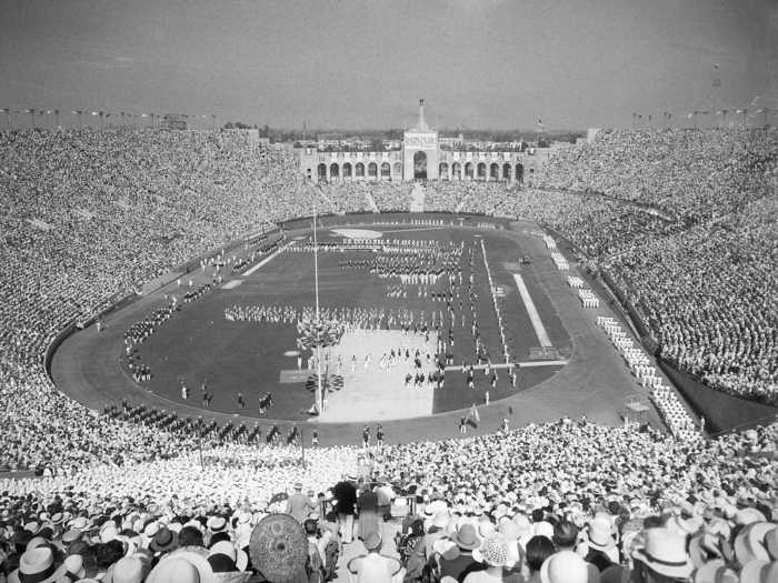 THEN: Los Angeles 1932 - Almost 2,000 athletes enter the Olympic Stadium in Los Angeles to join in the ceremonies opening the 10th Olympiad.