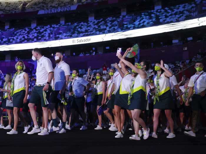 Swimmer Cate Campbell and basketball player Patty Mills led Australia into the stadium, wearing a look that was ready for summer fun.