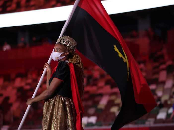 Flag bearer Natália Bernardo led Angola in an astounding look.