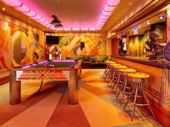 Below ground, there is an Art Deco-style bar and entertainment area.