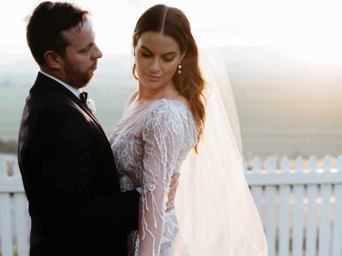 A floor-length veil completed the look.