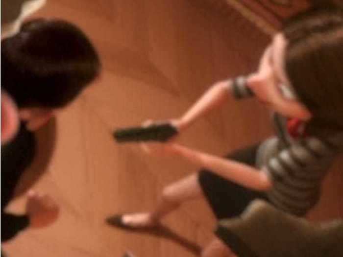 Remy sees a woman pointing a gun at her boyfriend in "Ratatouille."