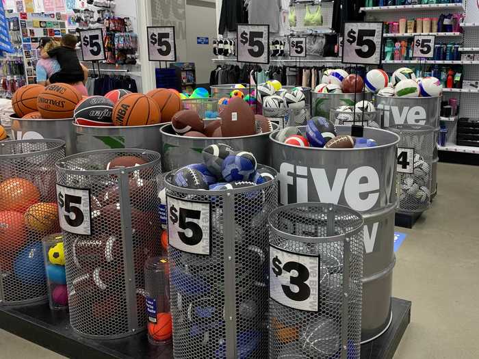 These workout supplies are behind more than a dozen buckets filled with footballs, soccer balls, volleyballs, and more.