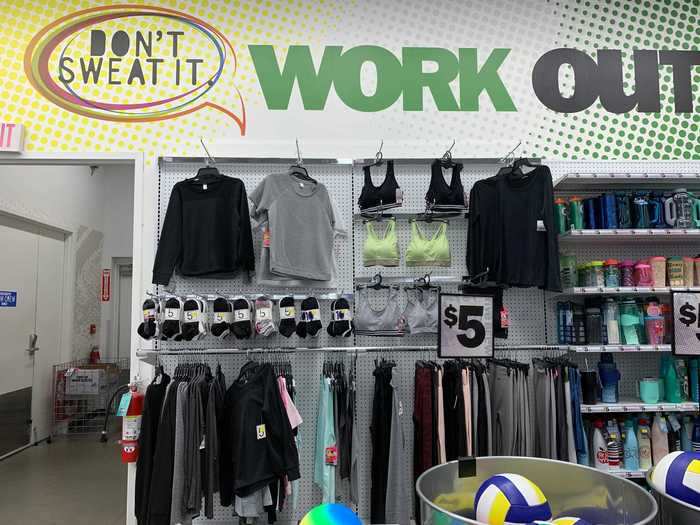 The back wall of the store is full of workout and athletic supplies.