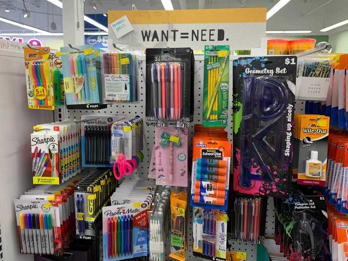 Displays of pens, pencils, and glue sticks wouldn