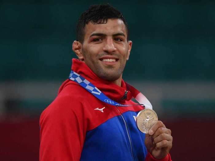 Two years after Saeid Mollaei fled his native Iran after authorities told him to purposefully lose a match, he won a silver Olympic medal in judo for Mongolia.