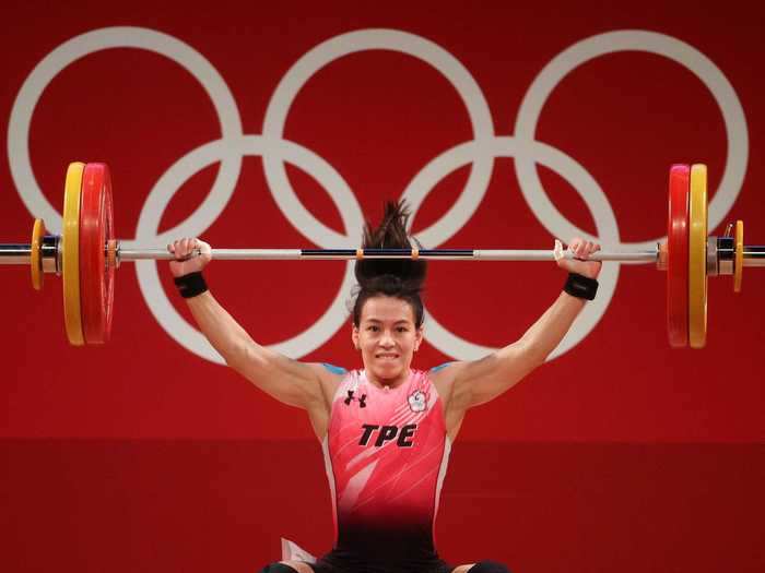 7/27: Hsing-Chun Kuo of Team Chinese Taipei competes during the Weightlifting - Women