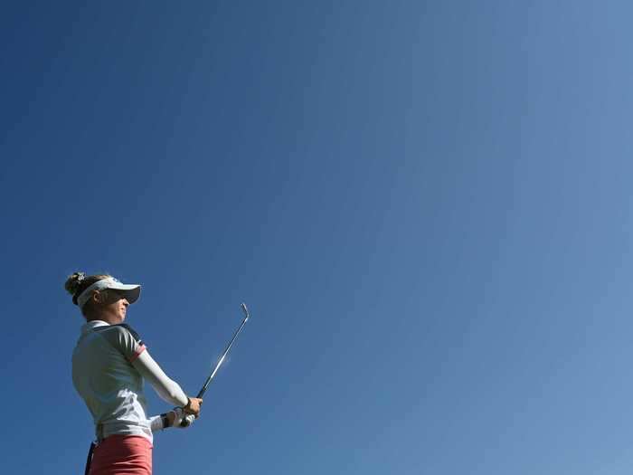 7/20: LPGA star Nelly Korda admires her shot at The Amundi Evian Championship.