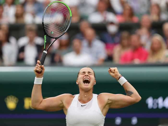 7/6: Aryna Sabalenka of Belarus celebrates match point in her quarterfinal match.