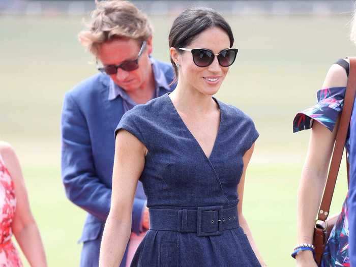 Later in July 2018, Markle went for a casual-chic look in a tea-length denim wrap dress to the Royal County of Berkshire Polo Club.