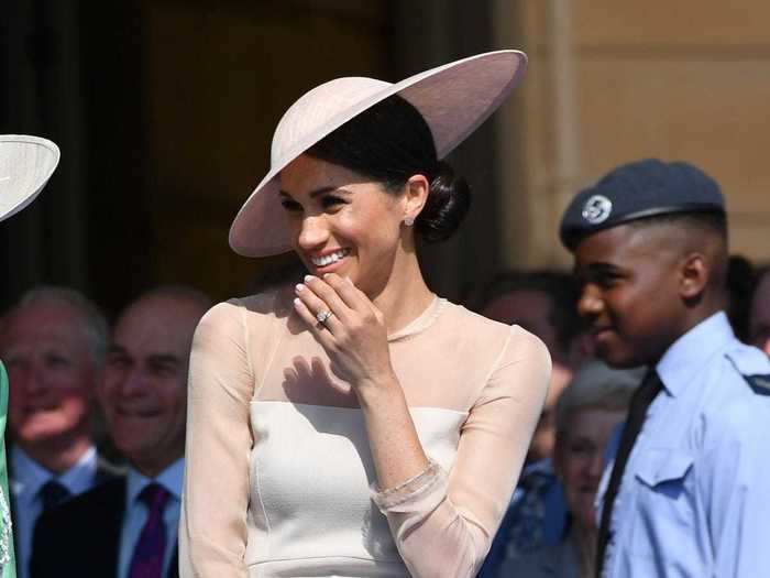 Markle wore a monochromatic pink outfit to the Prince of Wales