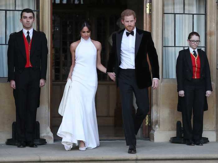 For her wedding reception that evening, Markle swapped out her Givenchy gown for a bespoke Stella McCartney number with a halter neckline.