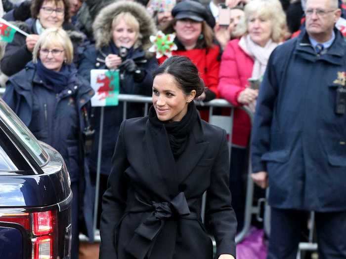 In January 2018, Markle wore a sleek ensemble that featured another wrap coat.