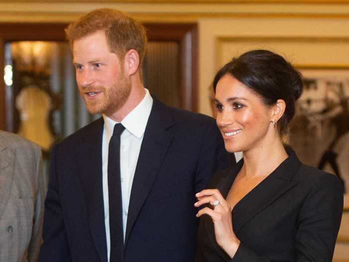 As she attended a 2018 gala performance of "Hamilton" with Prince Harry, Markle embraced the "no pants" trend with a smart tuxedo mini dress.