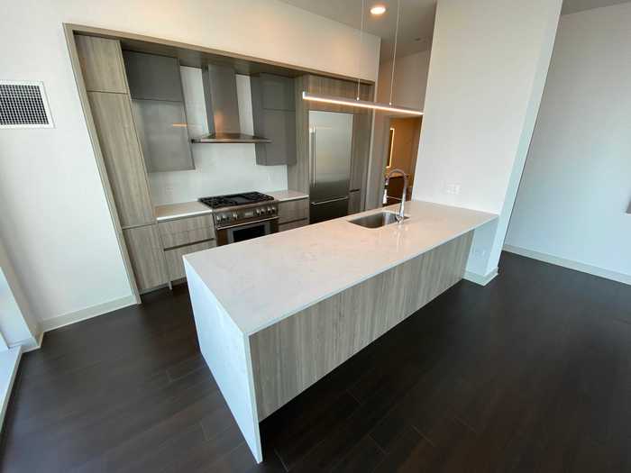 The kitchen is relatively small but has high-end finishings.