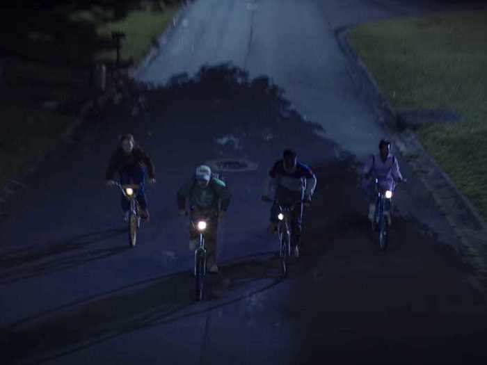 Then we see what looks like Max, Dustin, Lucas, and Erica riding their bikes together.