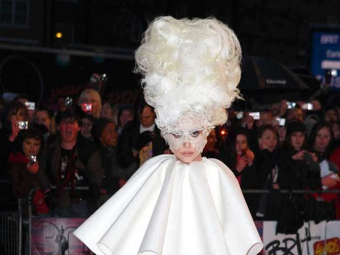 She wore yet another daring white ensemble at the Brit Awards that month.