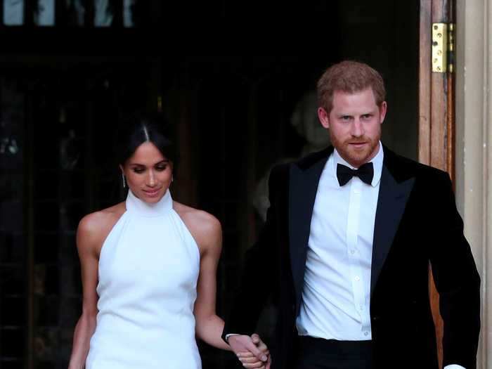 For the reception, Markle changed into a bespoke high-neck gown designed by Stella McCartney.