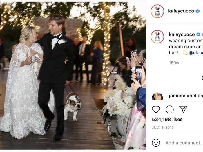 Kaley Cuoco tied the knot to equestrian Karl Cook in an embroidered dress with a chic cape.