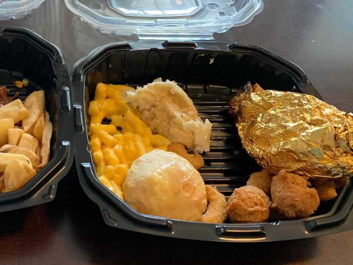 Two moderately-full takeout containers cost $26 total.