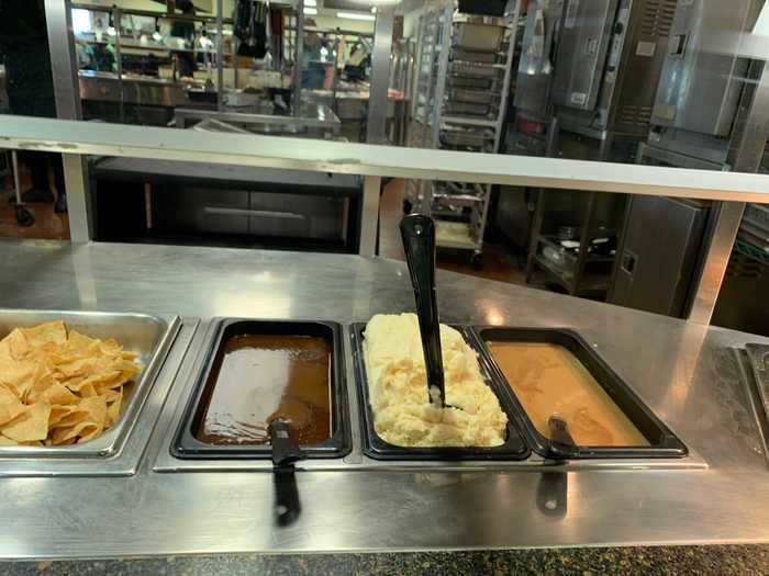 I could see cooks working behind the stations, and some areas like the mashed potatoes looked freshly refilled.