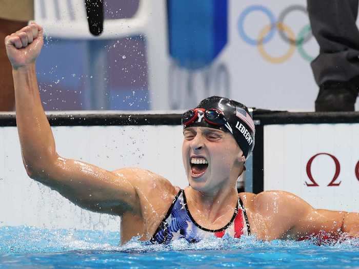 Ledecky celebrates winning - and setting an Olympic record - in the first-ever women