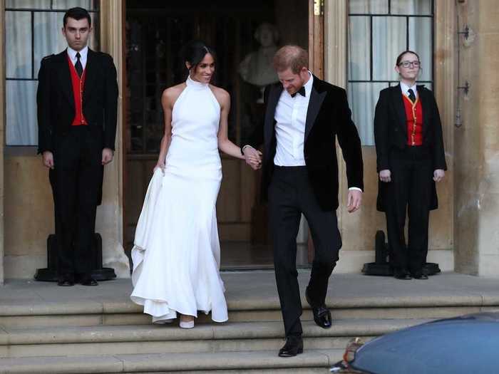 Markle changed into a Stella McCartney halter gown for the reception at Frogmore House.